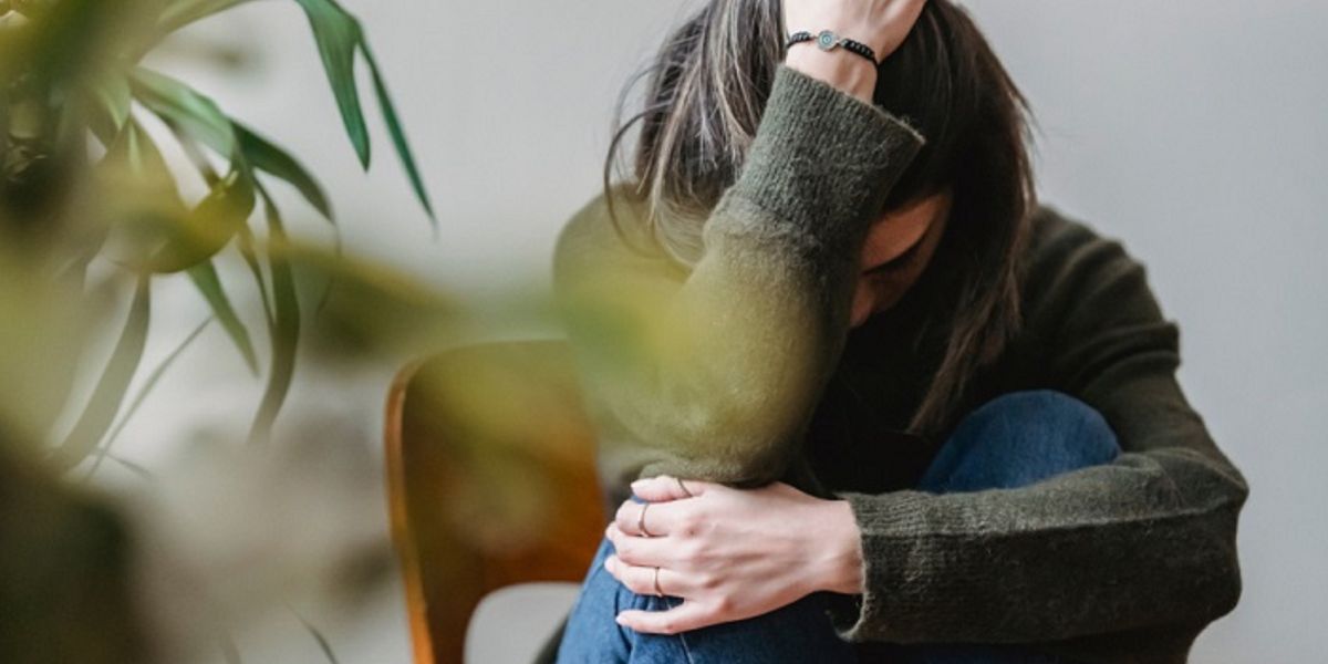 Lady under stress from cortisol levels