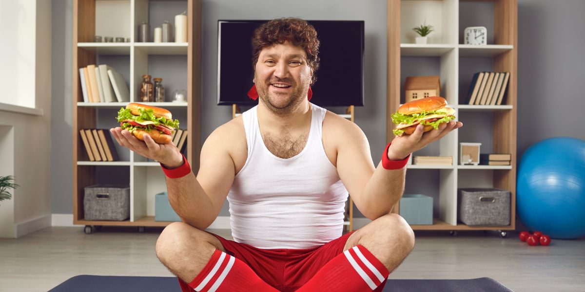 Gym person eating junk food