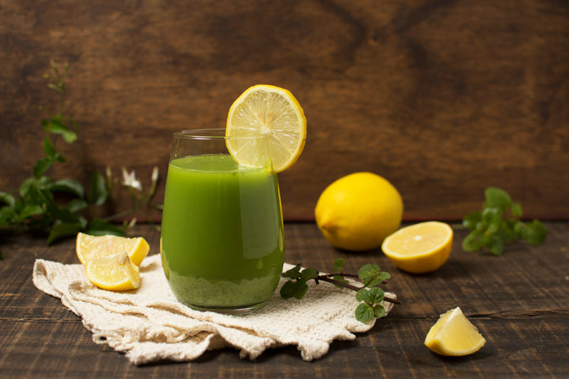 green smoothie and lemons