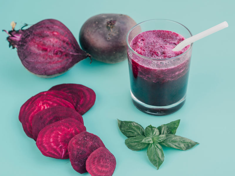 beetroot juice with fresh beetroot slices