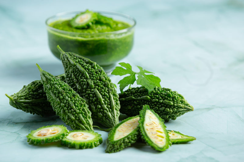7 Best Benefits of Karela in Ayurveda with Uses & Products